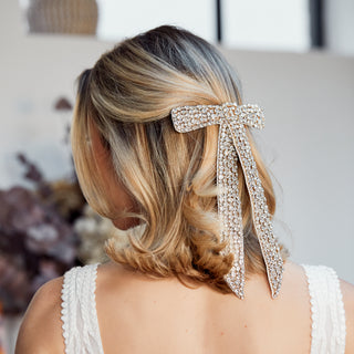 crystal bow hair accessory in gold 
