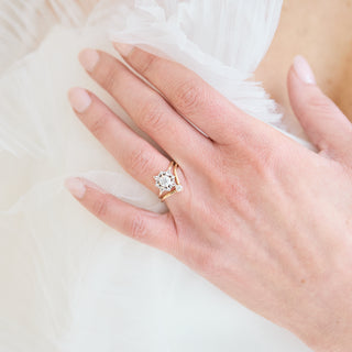 Moissanite, sapphire and diamond engagement ring in solid gold