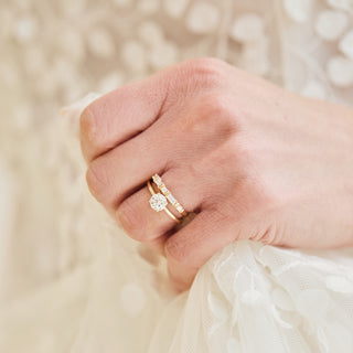 Moissanite and diamond wedding band in gold