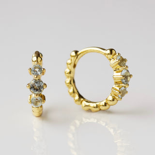 aquamarine huggie hoop earrings in gold