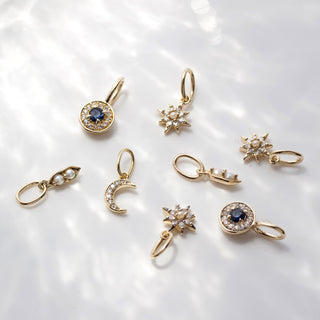evil eye sapphire protection charm in solid gold