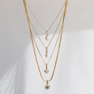 diamond and pearl vintage star charm in solid gold