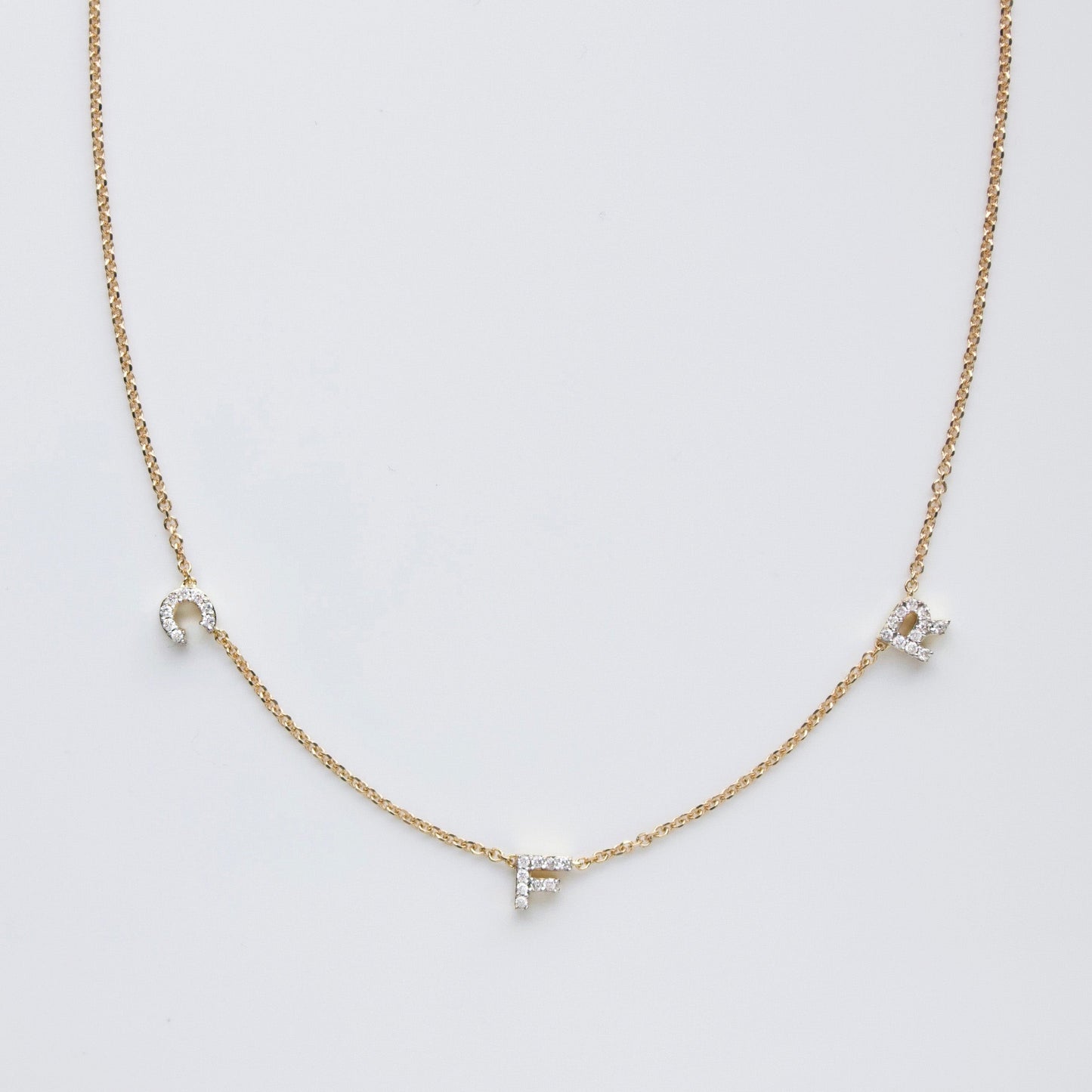 carrie elizabeth diamond initial personalised necklace in solid gold
