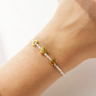 personalised pearl initial bracelet in gold