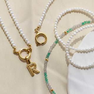 pearl front facing clasp necklace in gold