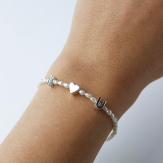 personalised pearl initial bracelet in silver