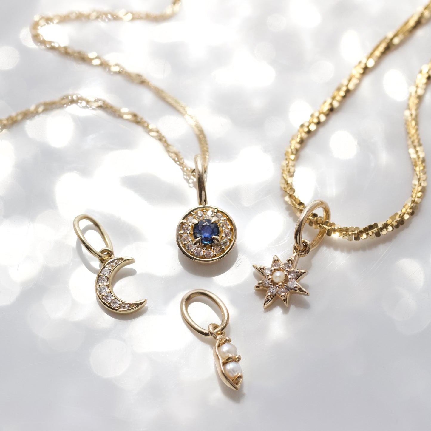 evil eye sapphire protection charm in solid gold