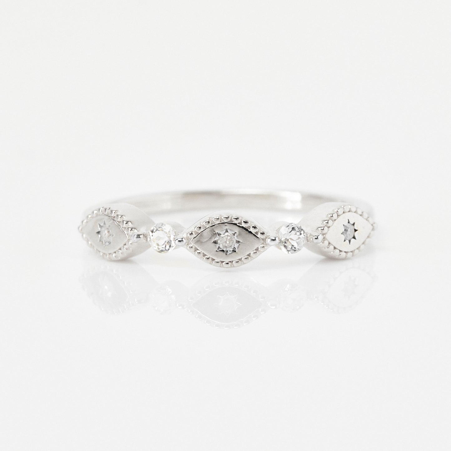 white topaz and diamond trapeze ring in silver