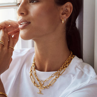 celestial cz tapered hoop earring in gold