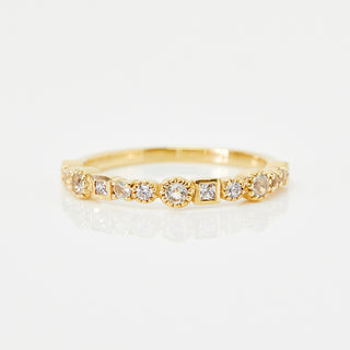 mixed stone and shape diamond and cz eternity ring in gold