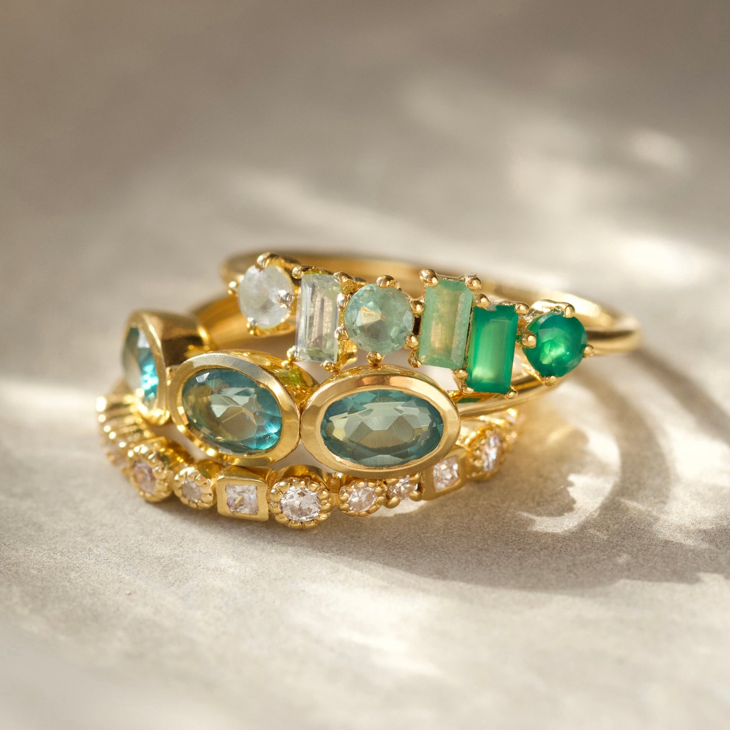 green ombre mixed gemstone ring in gold