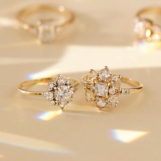 Moissanite, sapphire and diamond engagement ring in solid gold