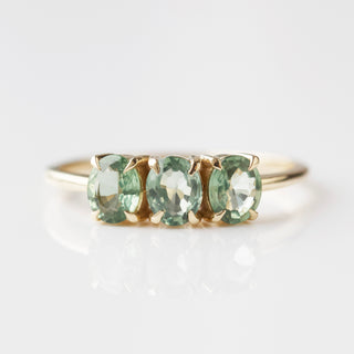 green sapphire ring in solid gold