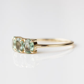 green sapphire ring in solid gold