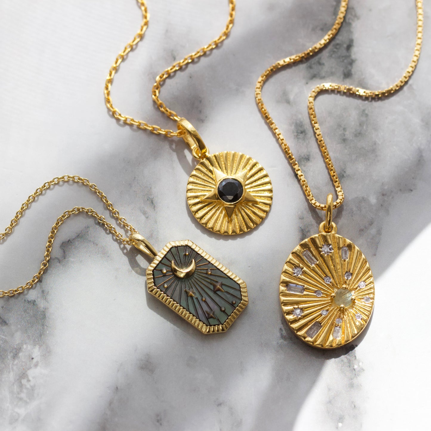 hematite star sunray necklace in gold