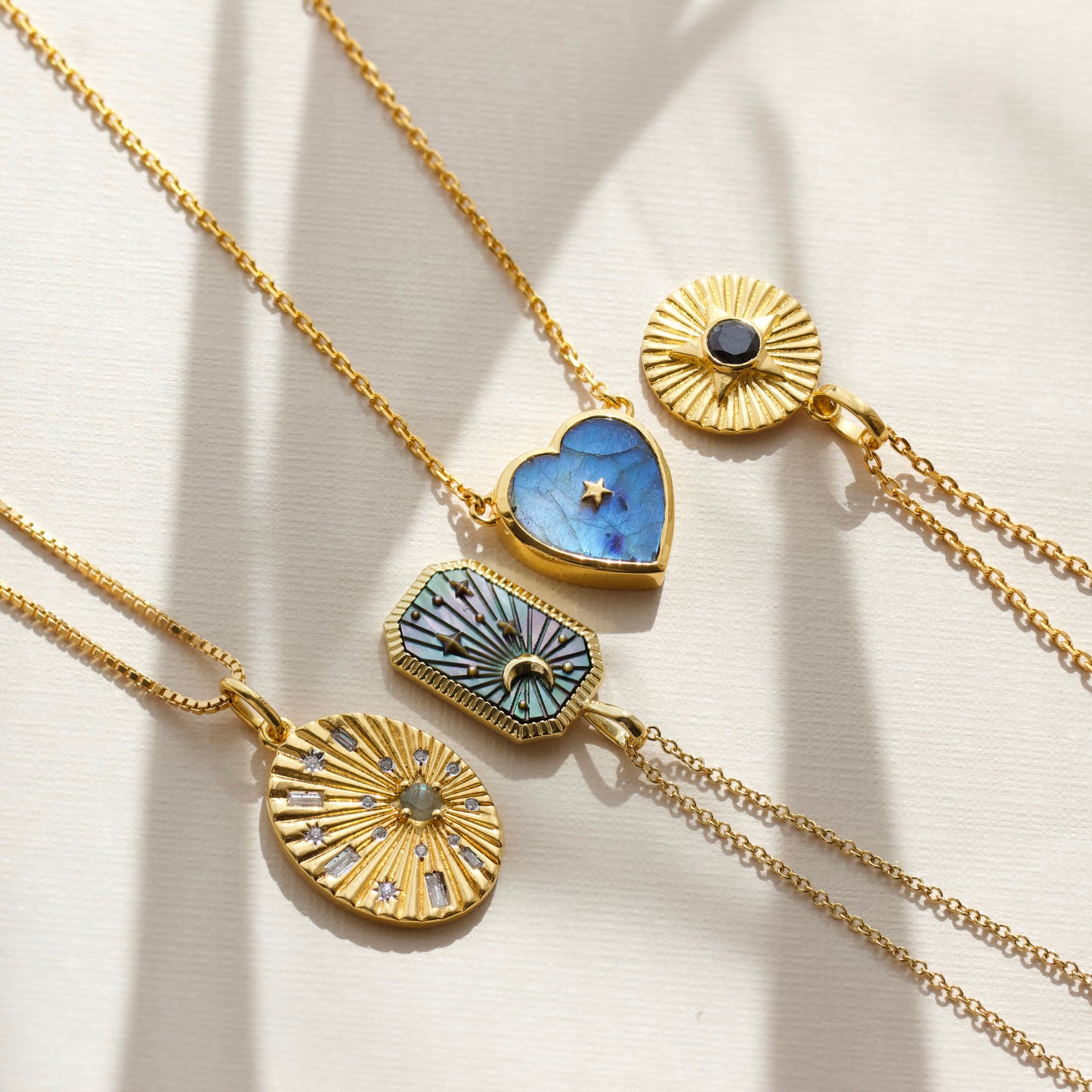 hematite star sunray necklace in gold