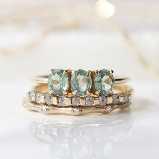 green sapphire ring in solid gold
