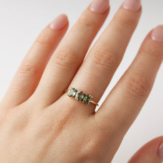 green sapphire ring in solid gold