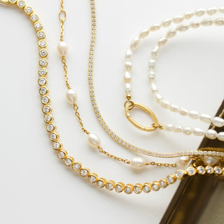Organic pearl infinity bracelet in gold