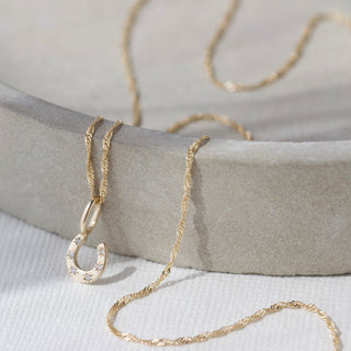 horseshoe good luck charm in solid gold
