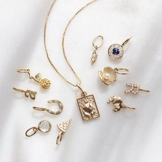 diamond peas in a pod charm in gold