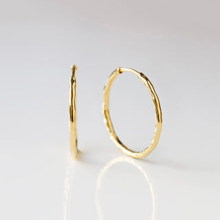 molten infinity hoop earrings