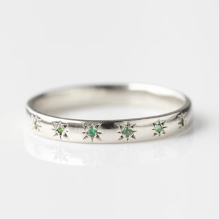 emerald star set ring in silver