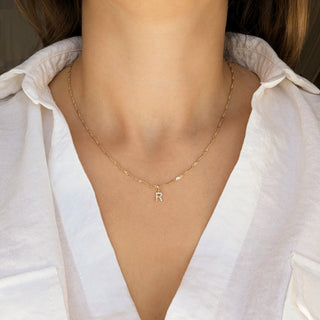 Carrie Elizabeth solid gold diamond initial charm on chain