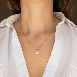 Carrie Elizabeth solid gold sapphire evil eye charm on chain