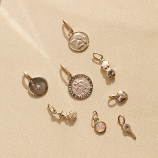 Carrie elizabeth st christopher protection charm in solid 9k gold