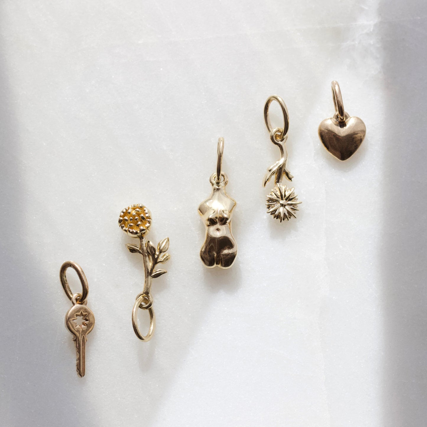 Carrie elizabeth birth flower charms 9k solid gold
