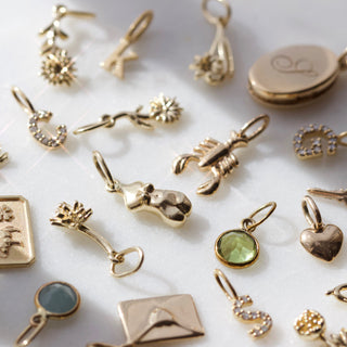 Carrie Elizabeth Coppafeel charity body charm solid gold