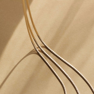 Carrie elizabeth slinky snake chain necklace in 9k solid gold