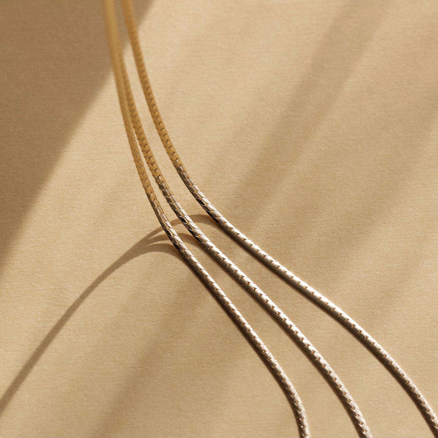 Carrie elizabeth slinky snake chain necklace in 9k solid gold