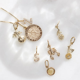Carrie elizabeth st christopher protection charm in solid 9k gold