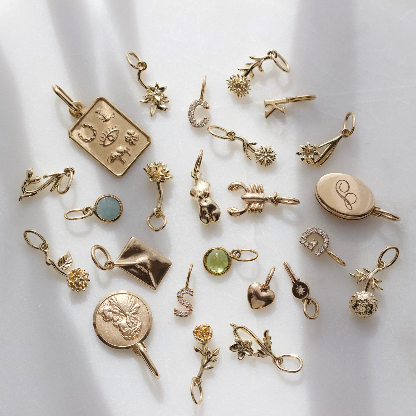 Carrie elizabeth birth flower charms 9k solid gold