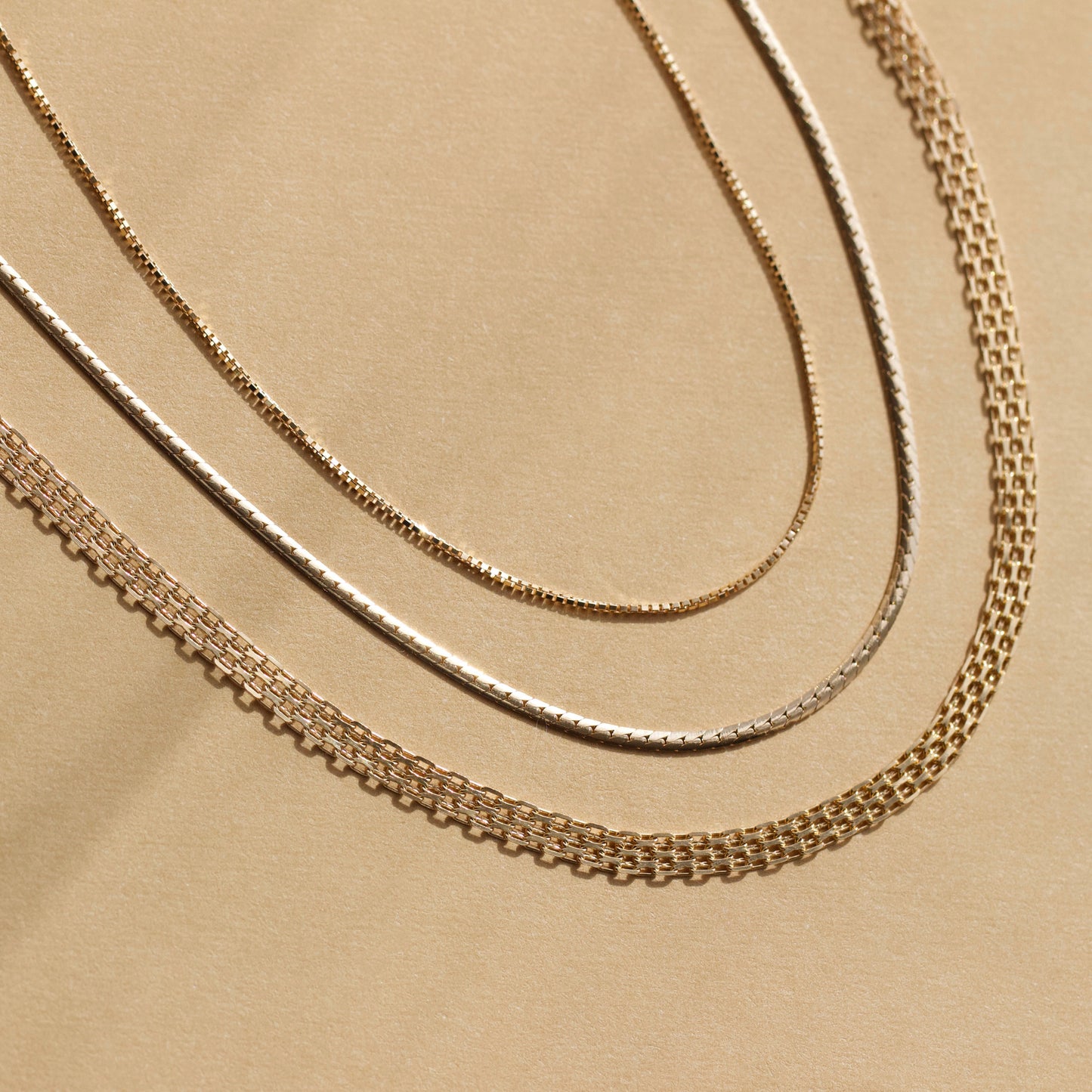 Carrie elizabeth slinky snake chain necklace in 9k solid gold