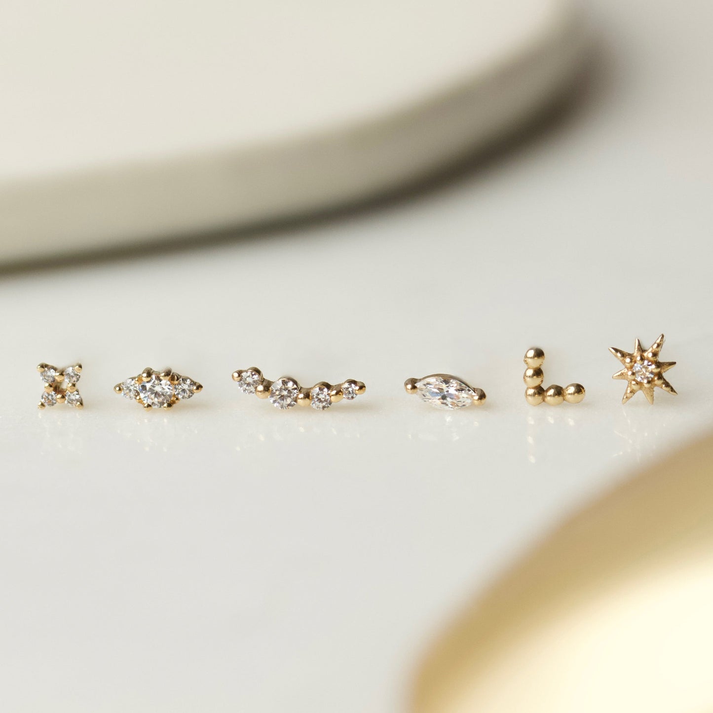 Meaningful solid gold earrings crafted by Carrie Elizabeth Jewellery