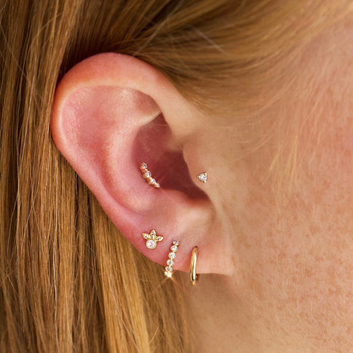 Meaningful solid gold earrings crafted by Carrie Elizabeth Jewellery