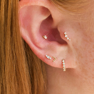 Meaningful solid gold earrings crafted by Carrie Elizabeth Jewellery