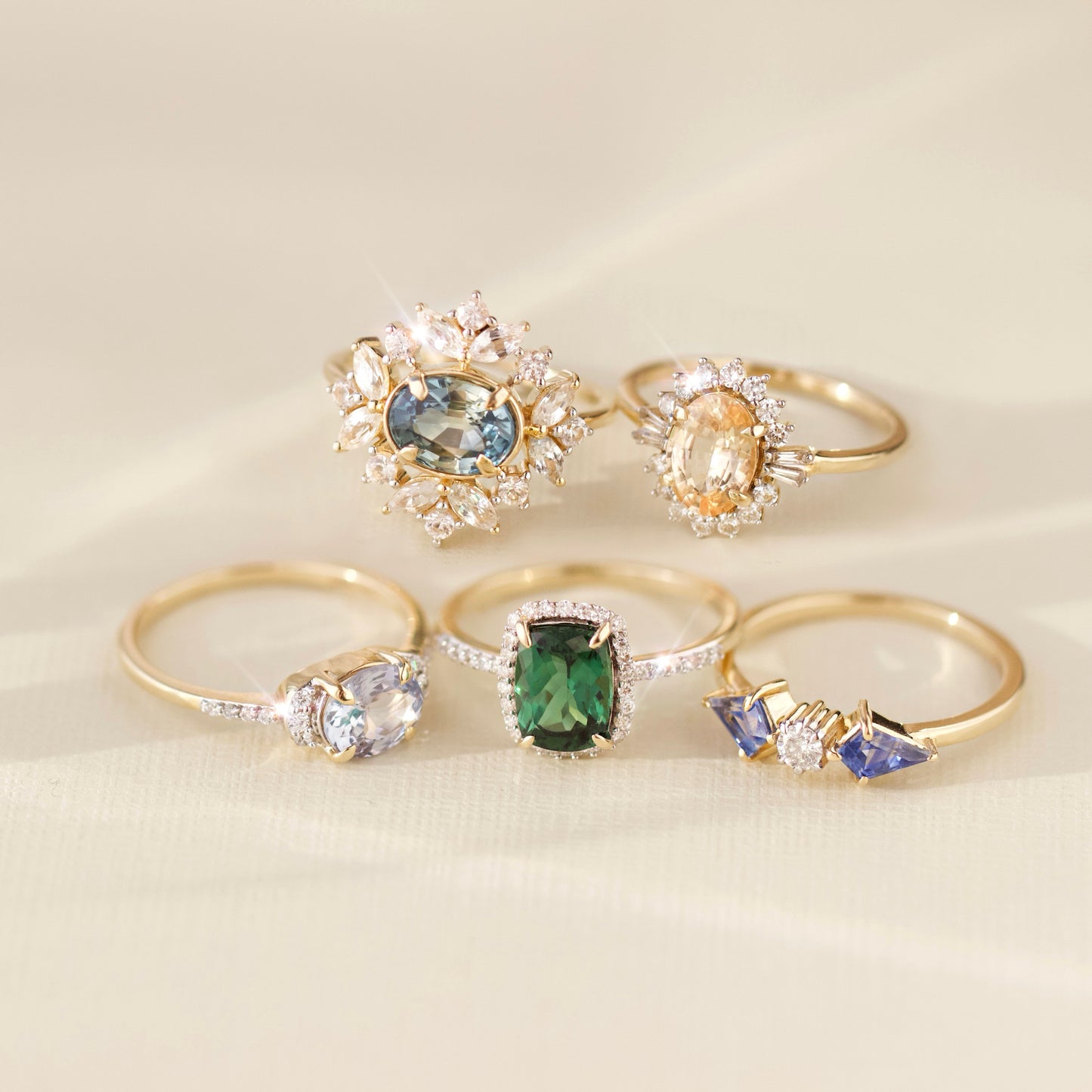 carrie Elizabeth solid gold exclusive engagement ring in teal & white sapphire