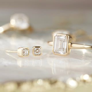 Carrie Elizabeth moissanite bezel set earrings in solid 9k gold