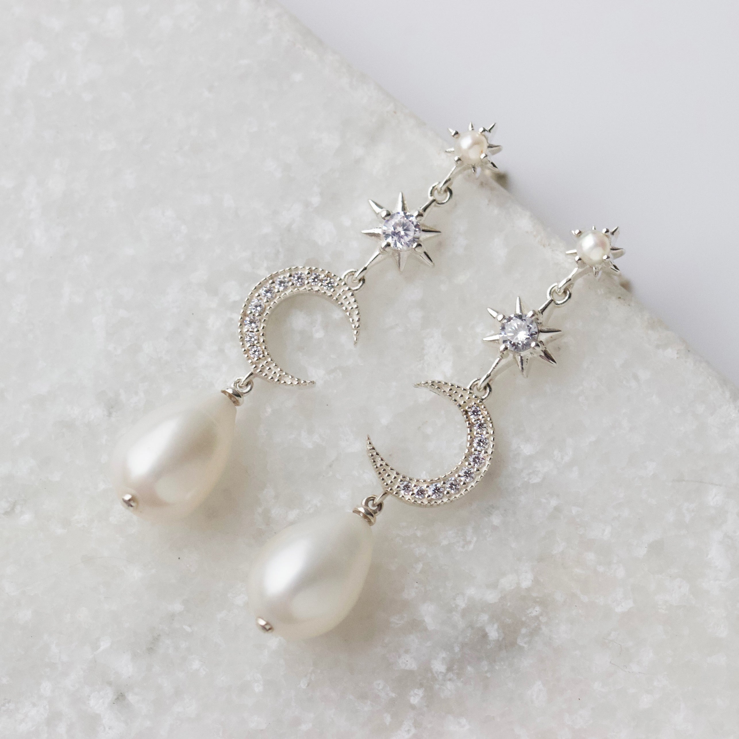 celestial pearl and cz statement earrings