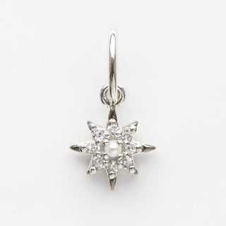 White gold vintage star charm in solid gold 