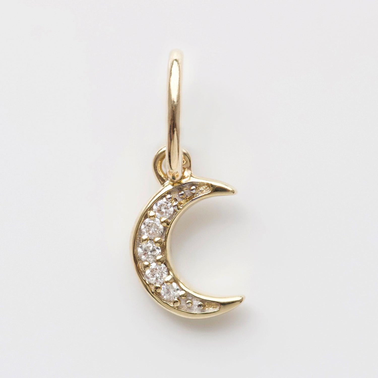 Crescent moon diamond charm in solid gold