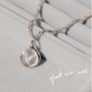 handwritten engraved pendant