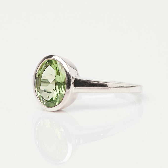 zoe sugg intentions courage peridot ring in silver