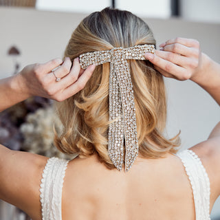 crystal bow hair accessory in gold 