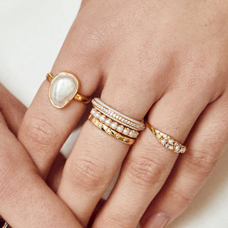 white enamel and zircon eternity ring