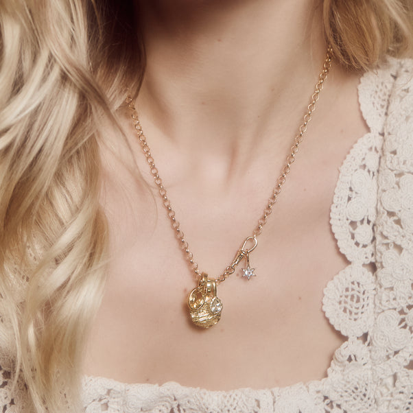 Molten Coin pendant in gold